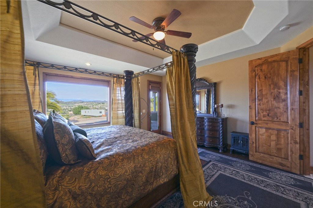 38101 Vía Lobato Temecula, CA 92592 - Photo 9 of 67 a bed sitting in a bedroom next to a window