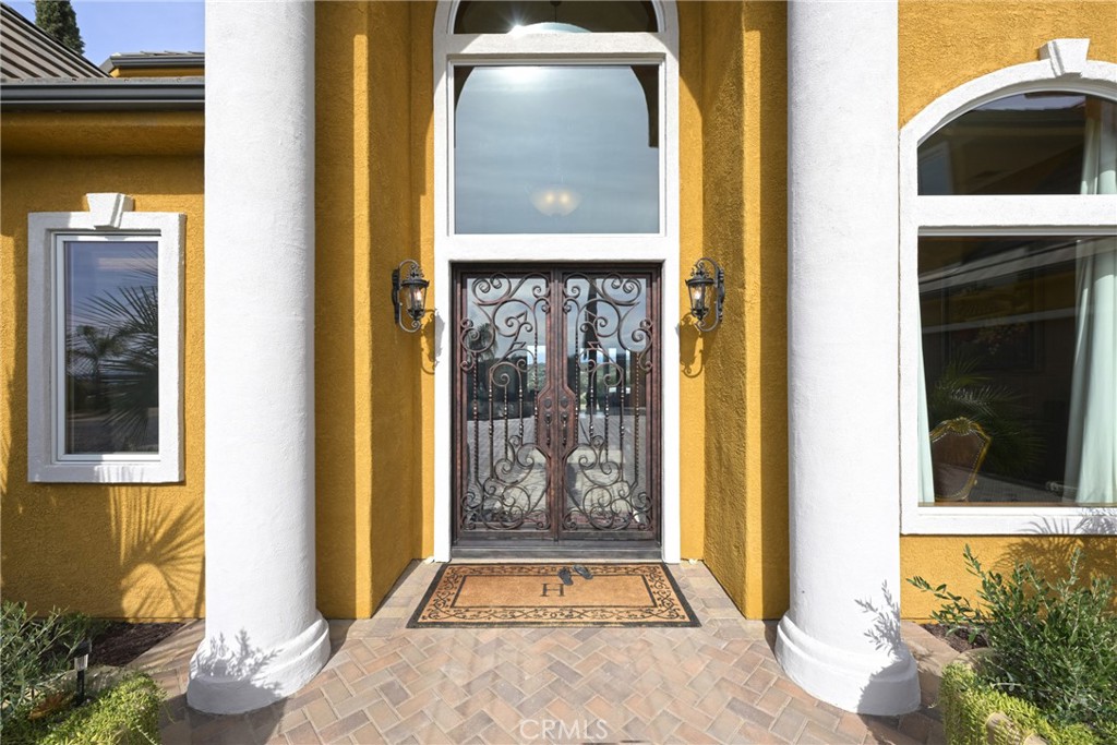 38101 Vía Lobato Temecula, CA 92592 - Photo 10 of 67 a front view of a house with a glass door