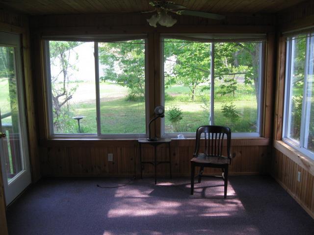 194 Weeks Mills Road South China, ME 04358 - Photo 14 of 27 Sunroom that leads out to back deck