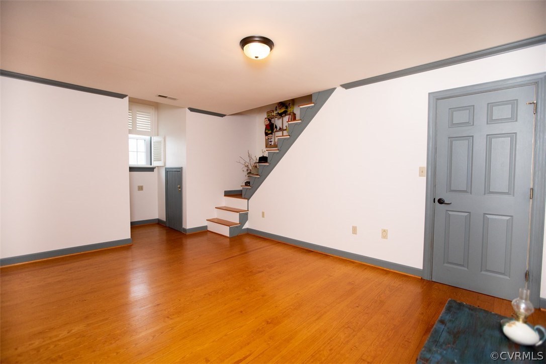 526 First Rock Road Prospect, VA 23960 - Photo 37 of 50 a view of an empty room with wooden floor and a window