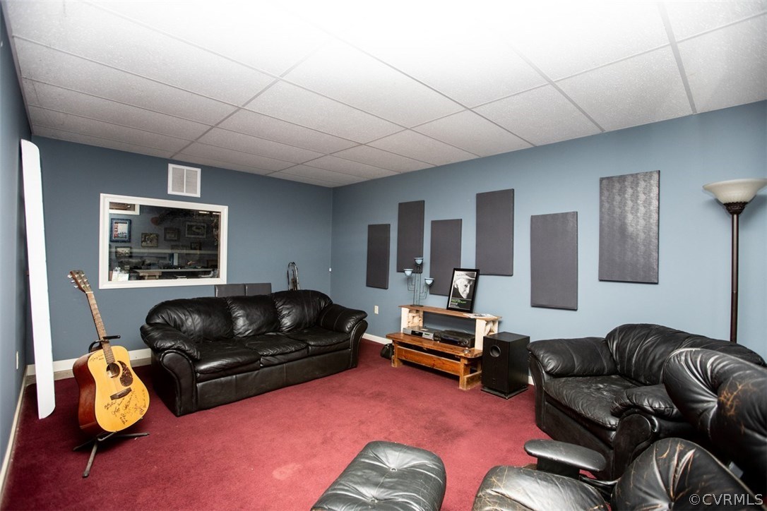 526 First Rock Road Prospect, VA 23960 - Photo 41 of 50 a living room with furniture gym equipment and a window