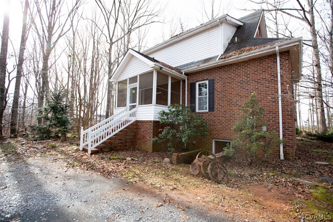 526 First Rock Road Prospect, VA 23960 - Photo 45 of 50 a front view of a house with garden