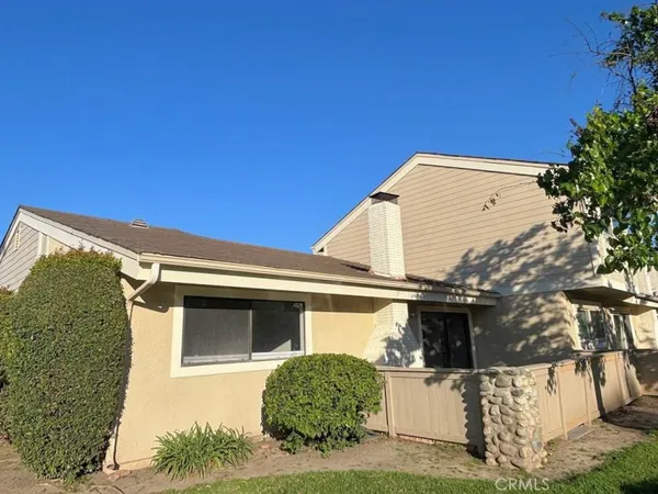 a view of a house with a large window