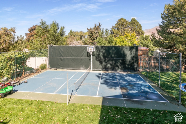 1764 West 1200th Street North Mapleton, UT 84664 - Photo 25 of 35 Multi-sport court with a basketball hoop and net, surrounded by chain-link fencing