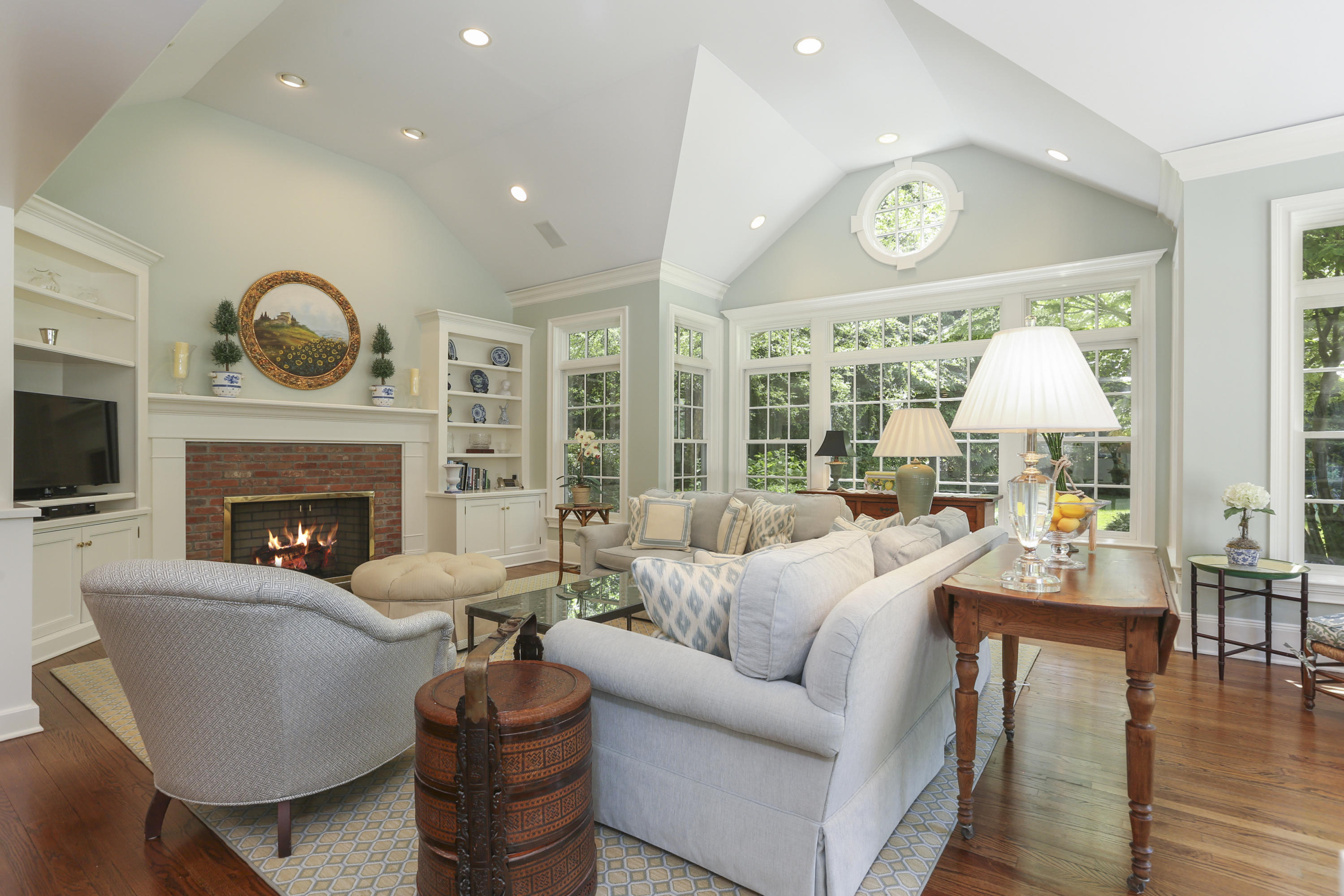 10 Deepwood Road Darien, CT 06820 - Photo 13 of 38 a living room with fireplace furniture and a large window