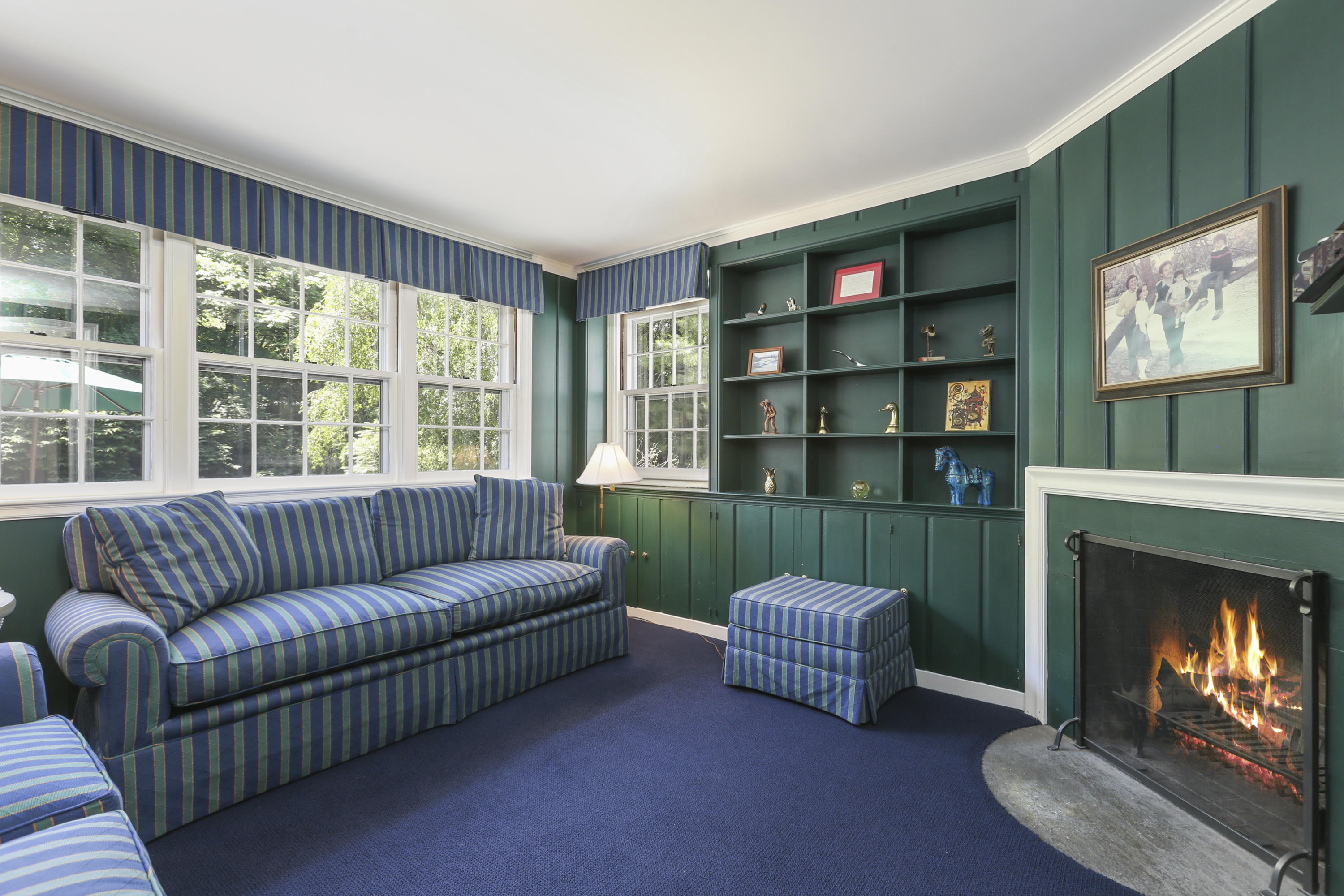 10 Deepwood Road Darien, CT 06820 - Photo 15 of 38 a living room with furniture and a fireplace