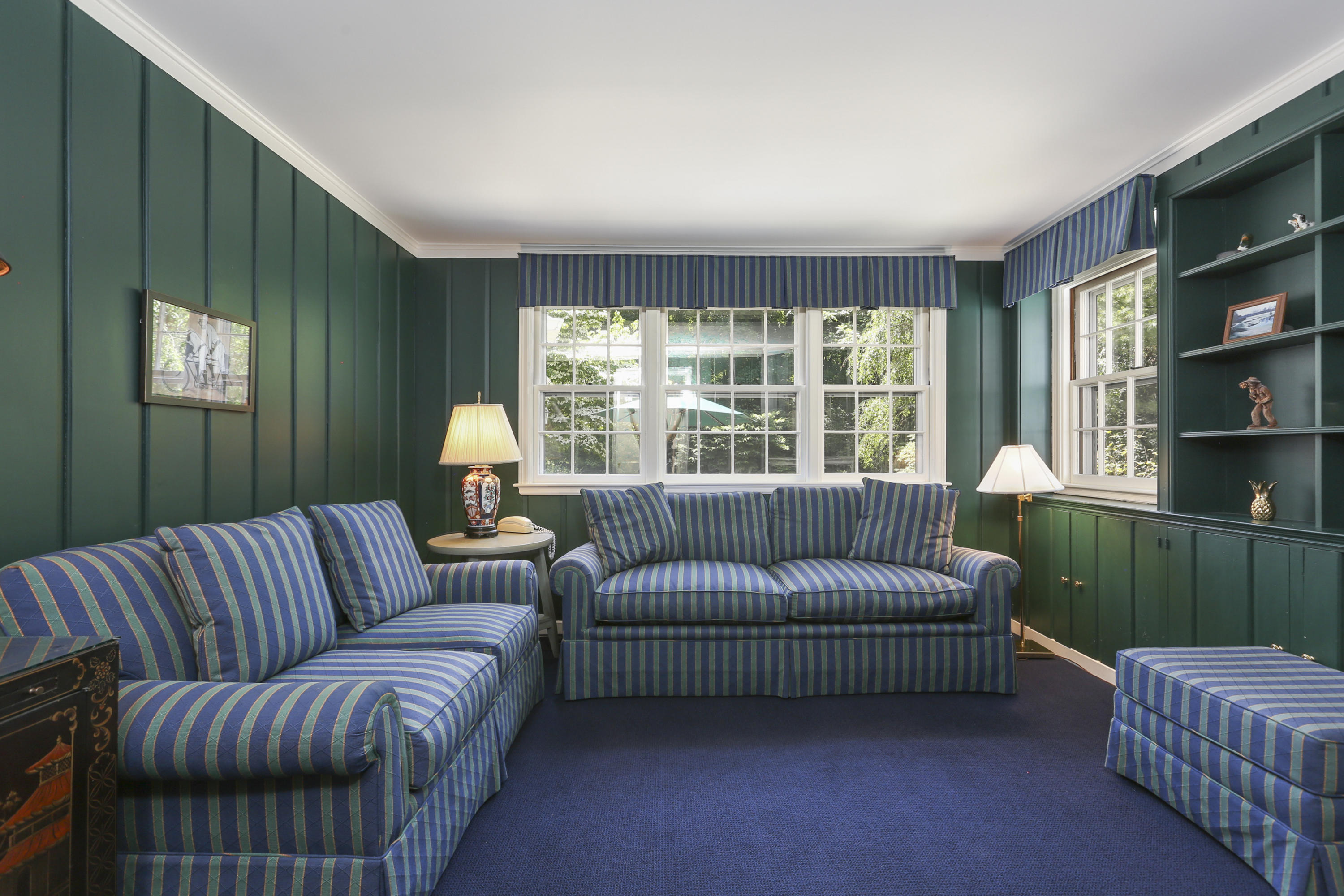 10 Deepwood Road Darien, CT 06820 - Photo 16 of 38 a living room with furniture and a window