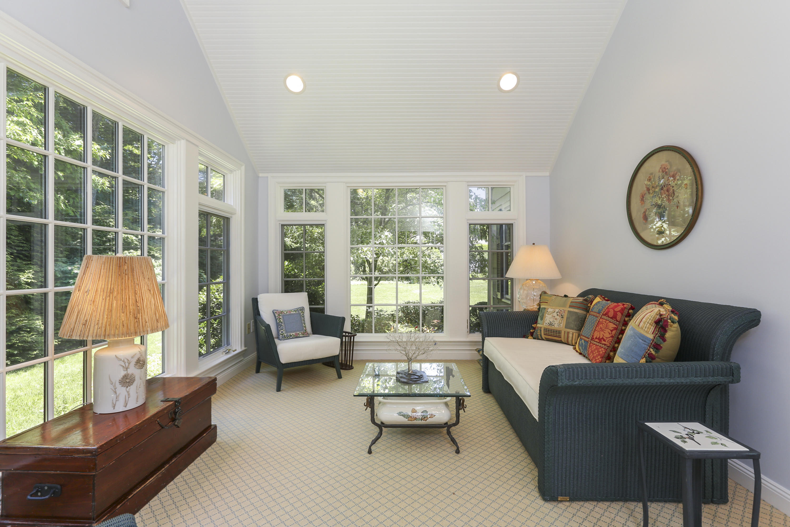 10 Deepwood Road Darien, CT 06820 - Photo 17 of 38 a living room with furniture a table and a large window