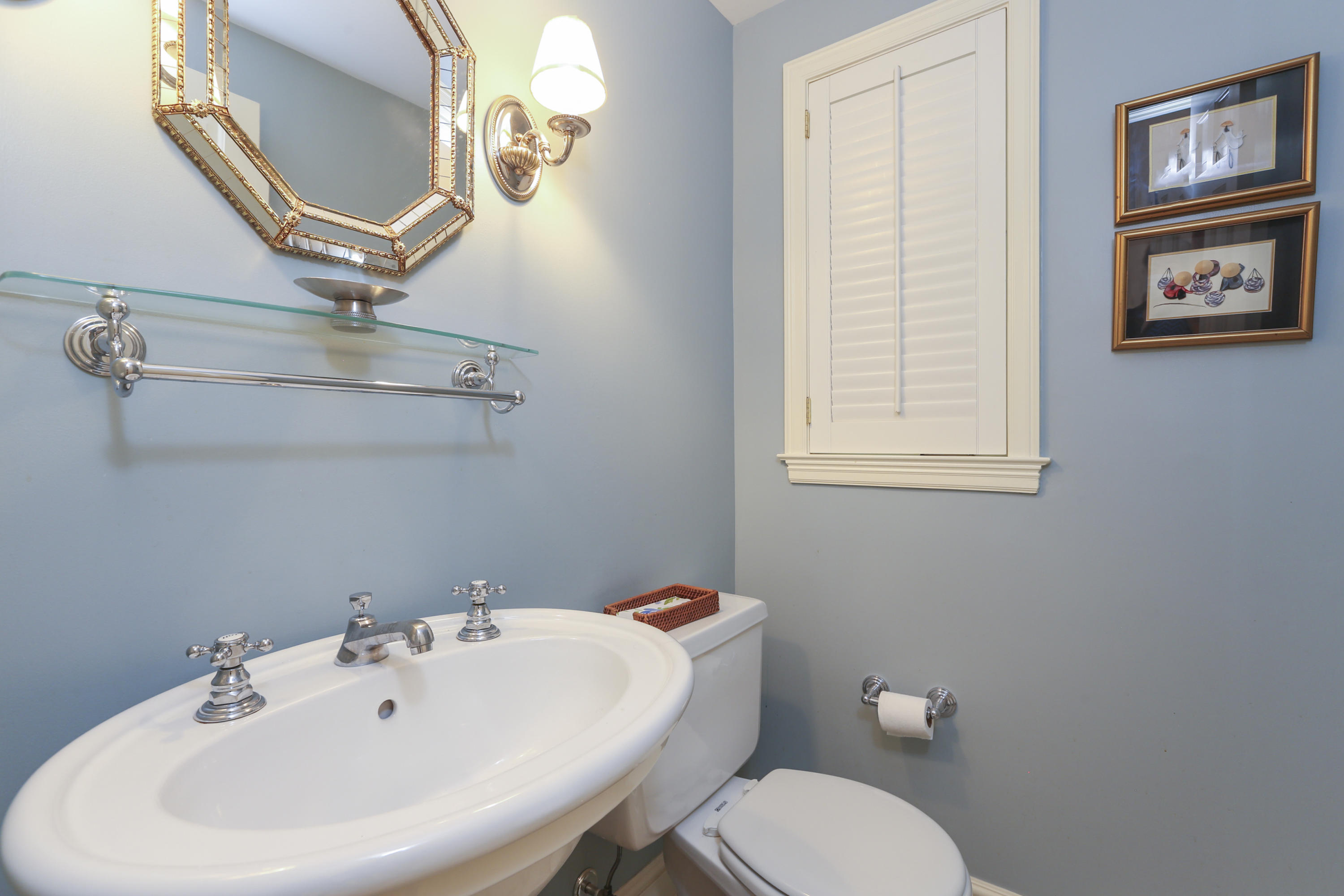10 Deepwood Road Darien, CT 06820 - Photo 20 of 38 a bathroom with a sink a mirror and a toilet