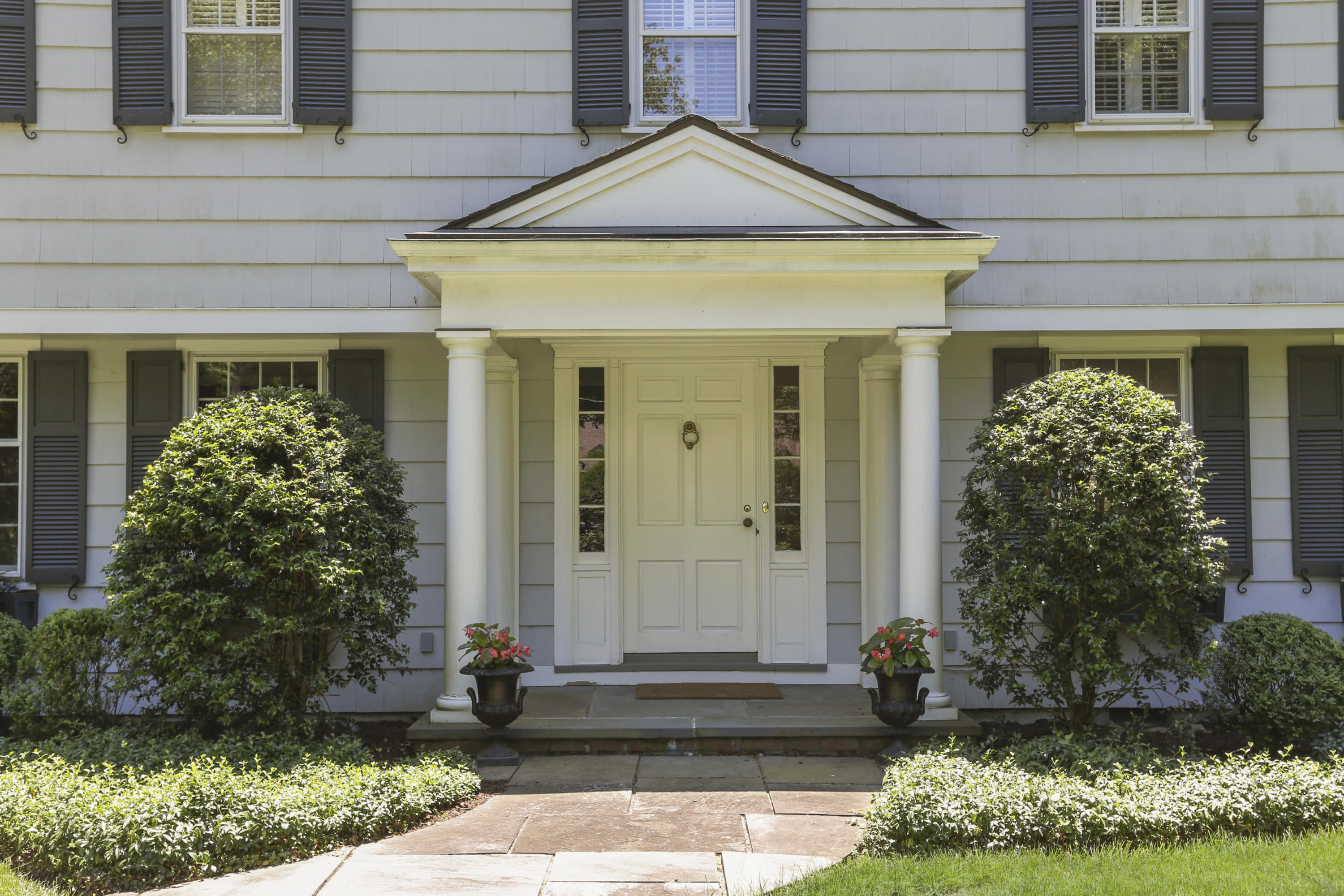 10 Deepwood Road Darien, CT 06820 - Photo 3 of 38 a front view of a house with garden