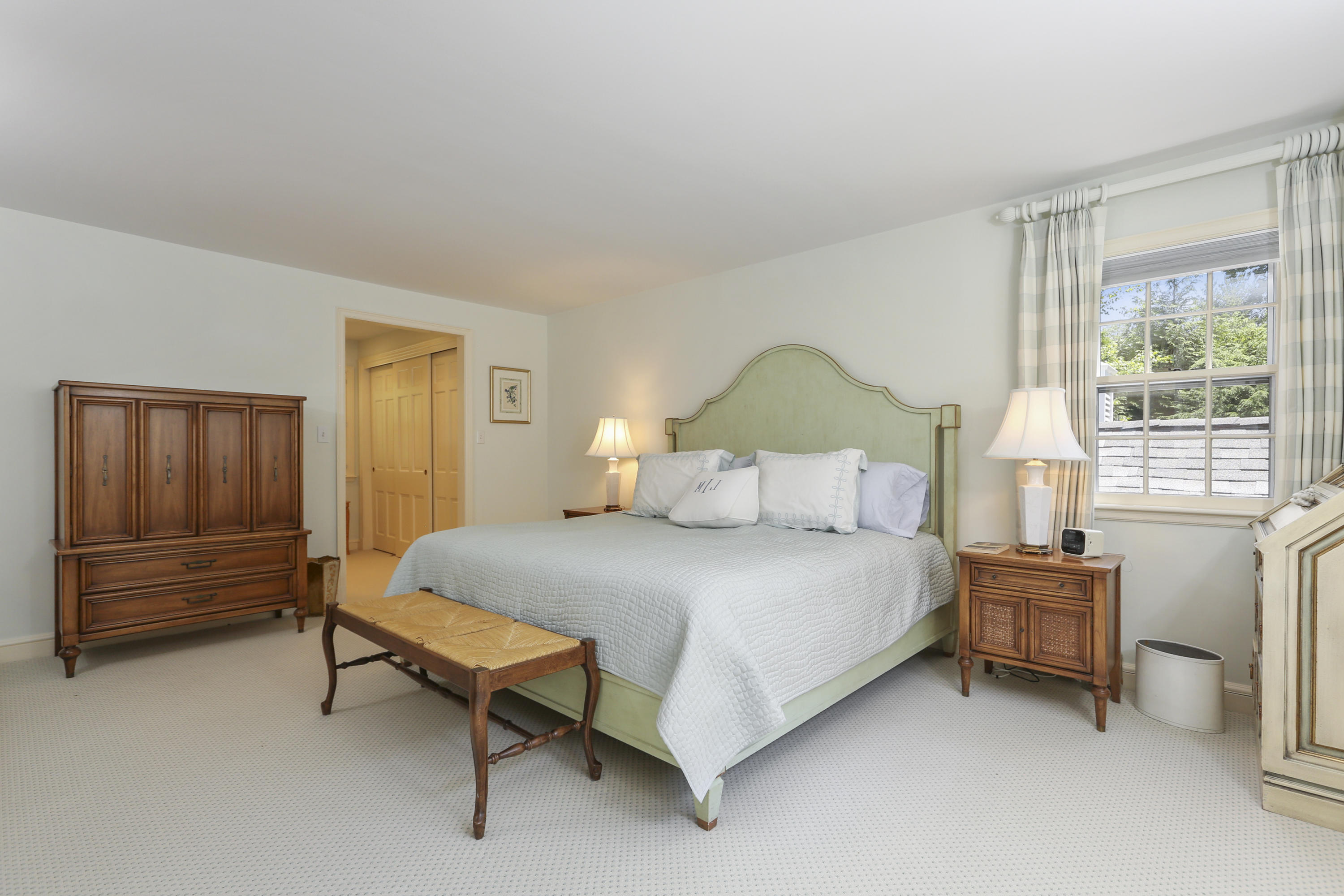 10 Deepwood Road Darien, CT 06820 - Photo 22 of 38 a bedroom with a bed and a window