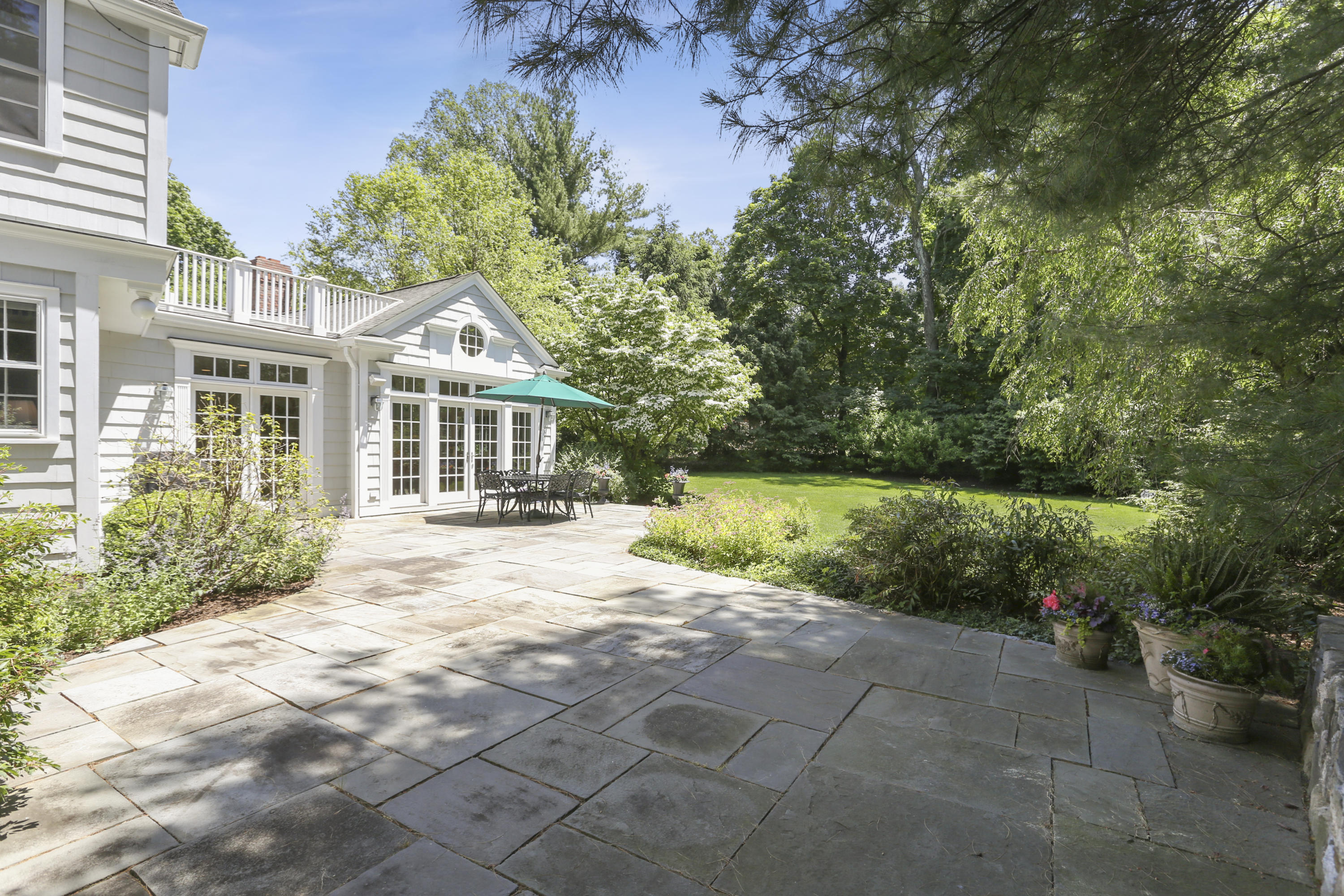 10 Deepwood Road Darien, CT 06820 - Photo 29 of 38 a view of a house with a garden