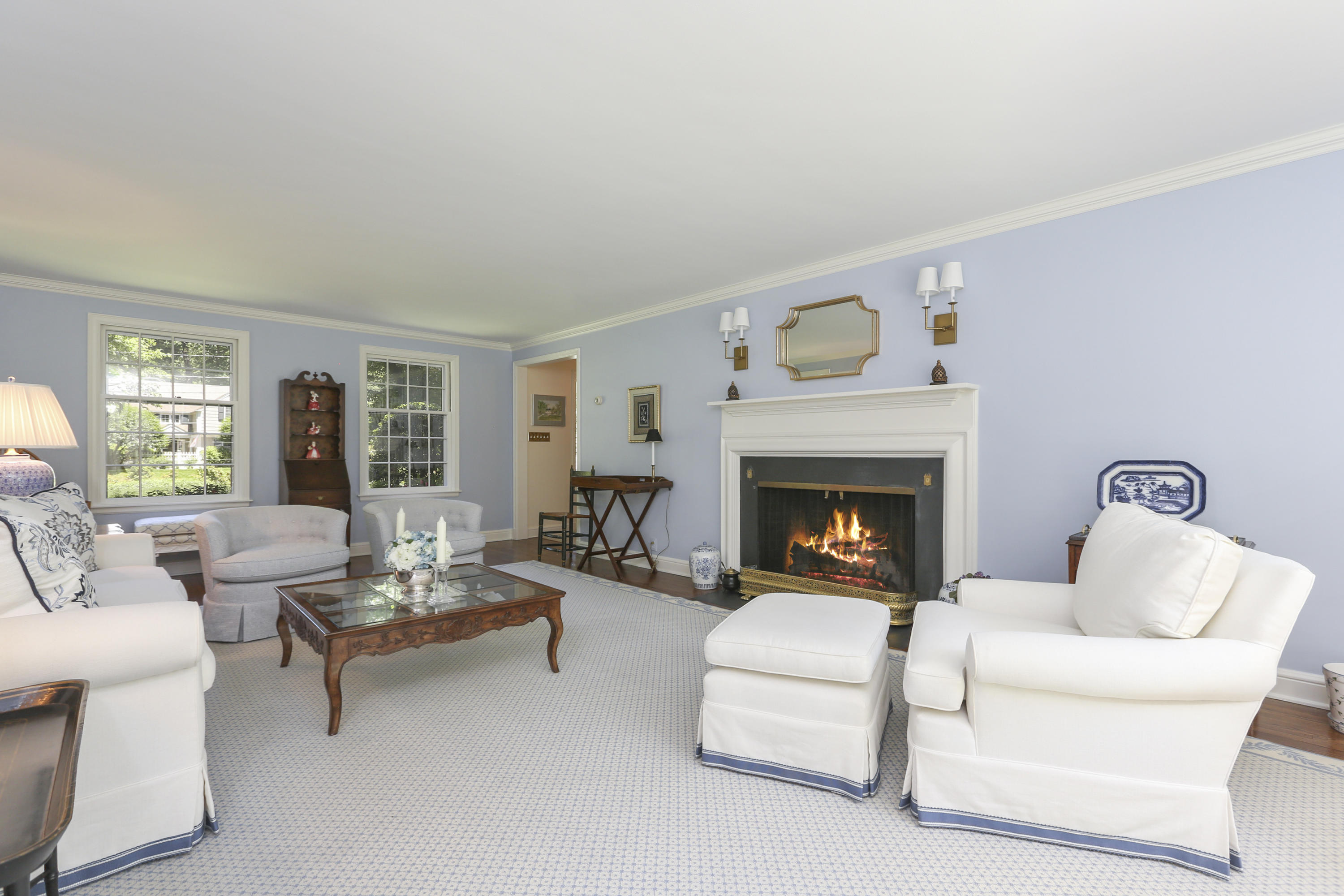 10 Deepwood Road Darien, CT 06820 - Photo 5 of 38 a living room with furniture and a fireplace