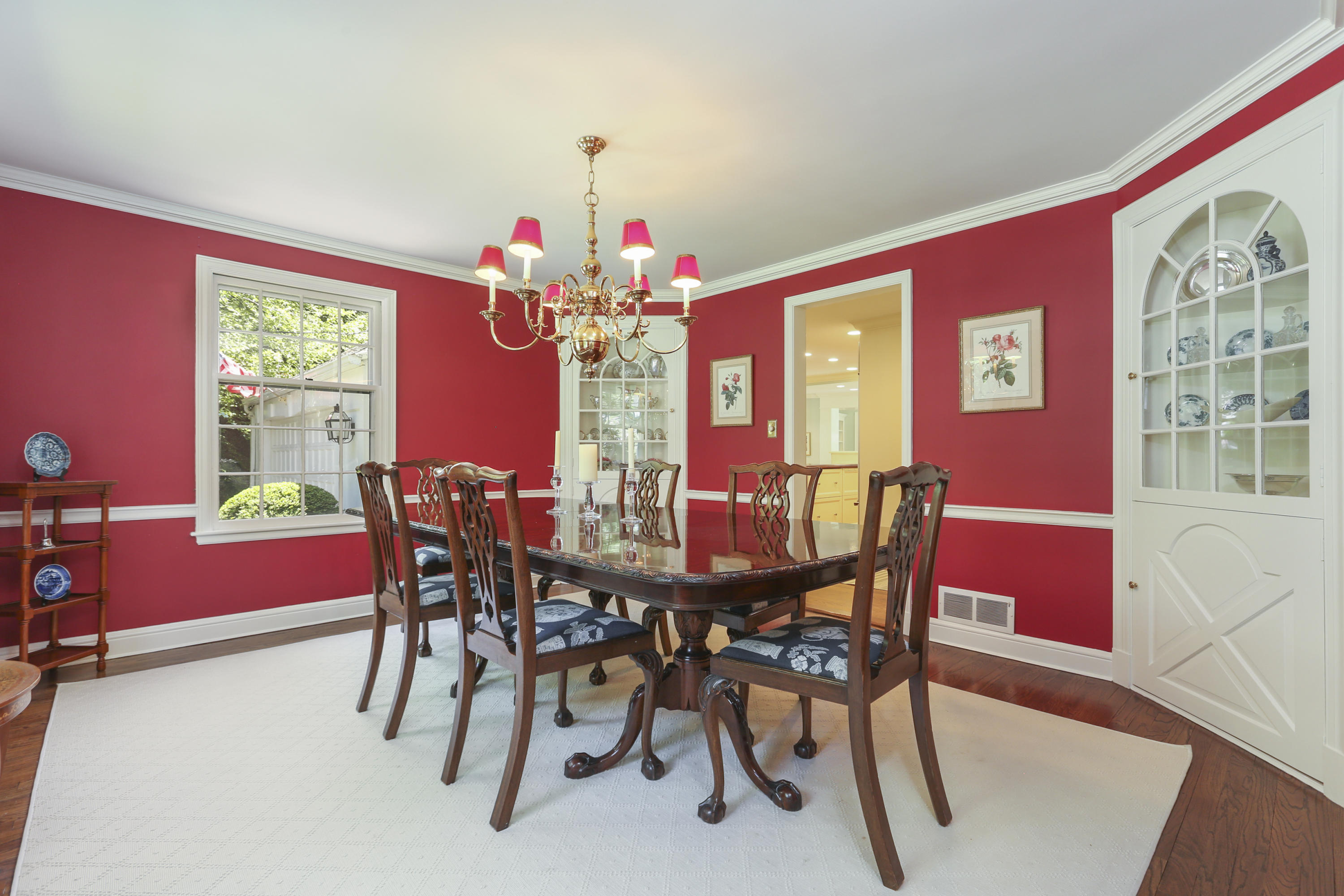 10 Deepwood Road Darien, CT 06820 - Photo 7 of 38 a view of a dining room with furniture and a chandelier