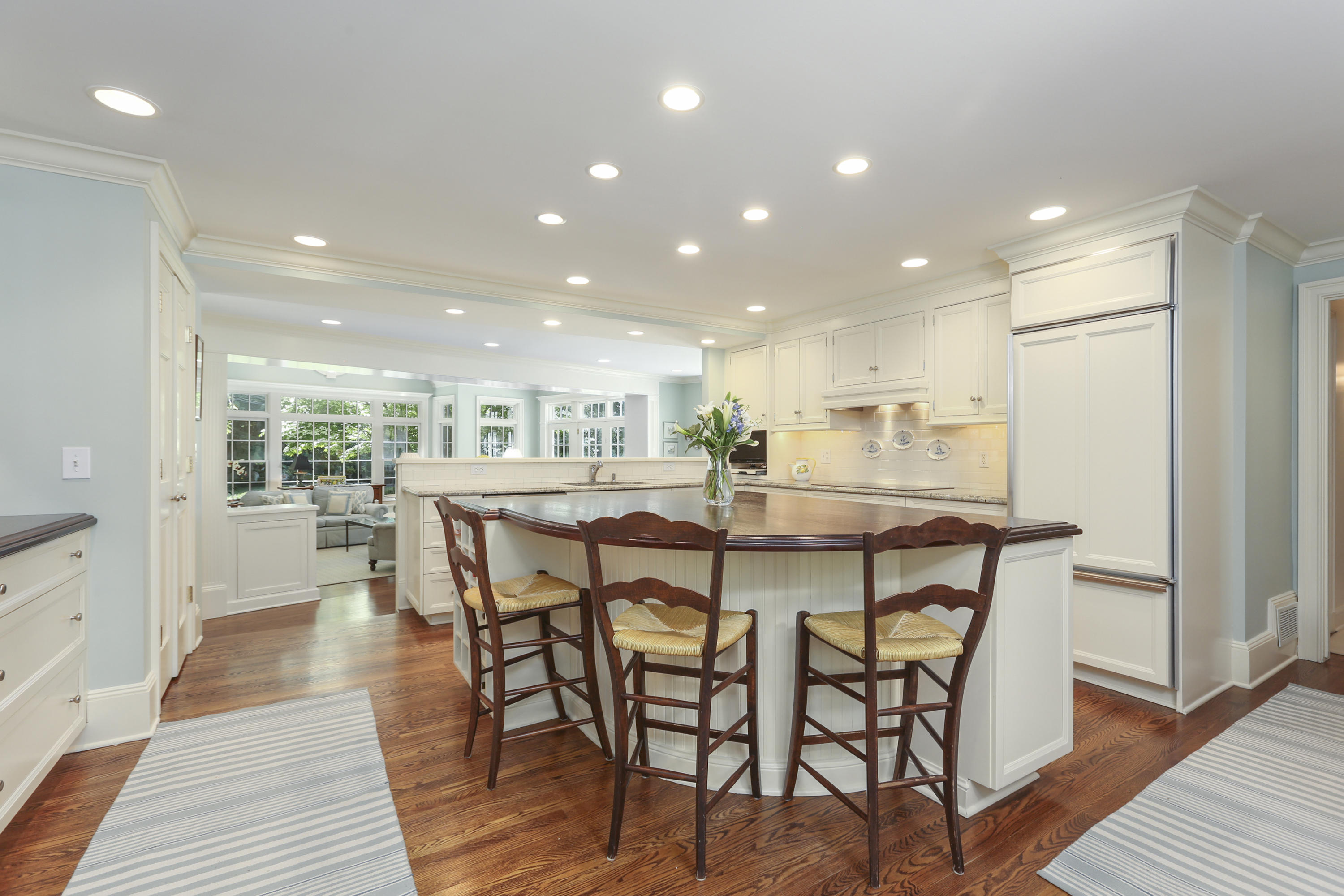 10 Deepwood Road Darien, CT 06820 - Photo 8 of 38 a dining area with furniture and wooden floor