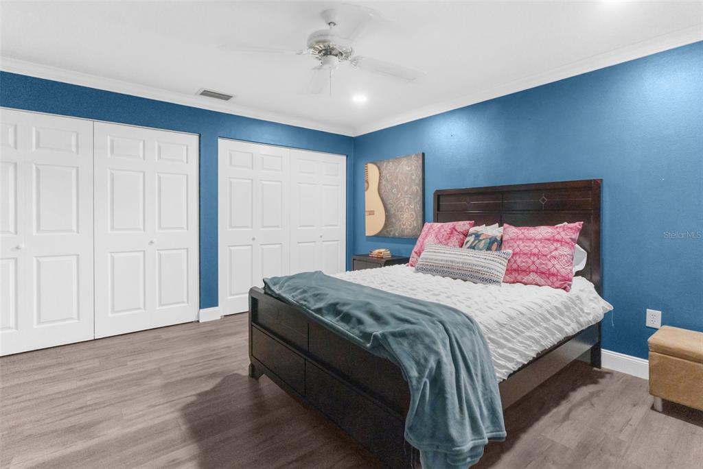 13119 Topflite Court Hudson, FL 34669 - Photo 15 of 26 a bedroom with bed and window