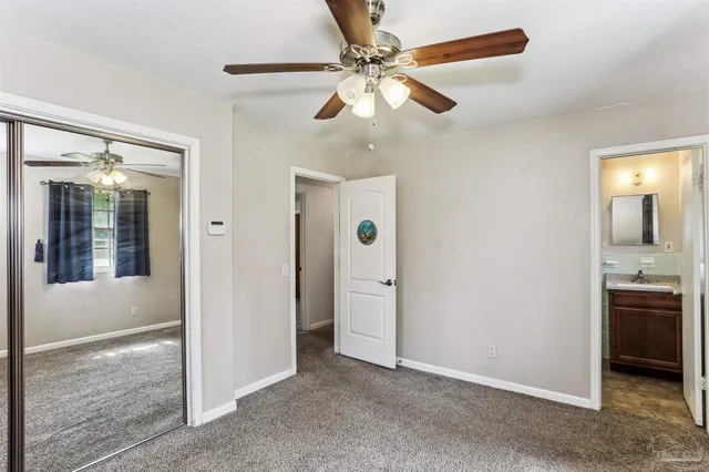 a view of livingroom with hardwood floor and ceiling fan