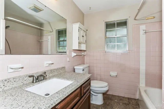 a view of a patio with table and chairs garden