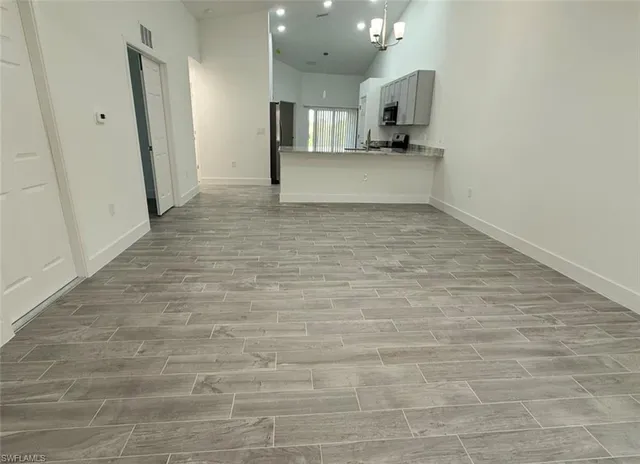 a view of a kitchen with a sink