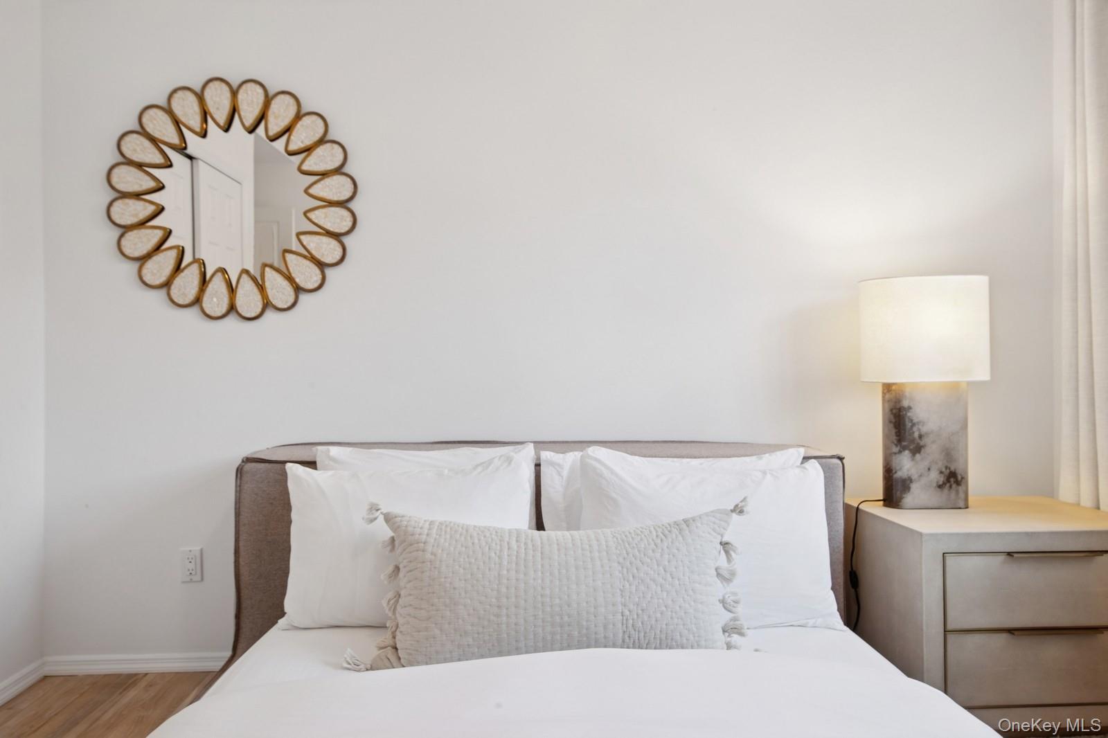 62 Sea Farm Lane Bridgehampton, NY 11932 - Photo 14 of 25 a bedroom with a bed and bathroom