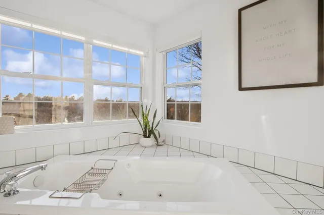 a view of a living room with a large window