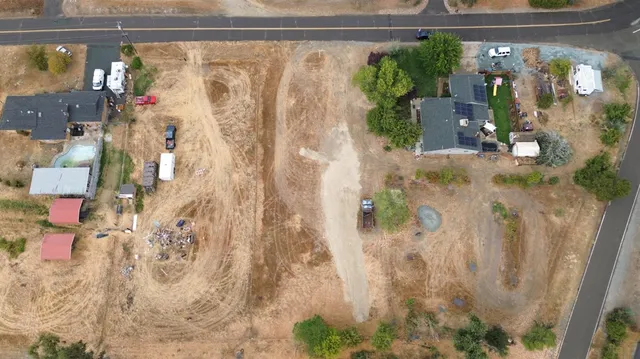 a view of yard covered with snow