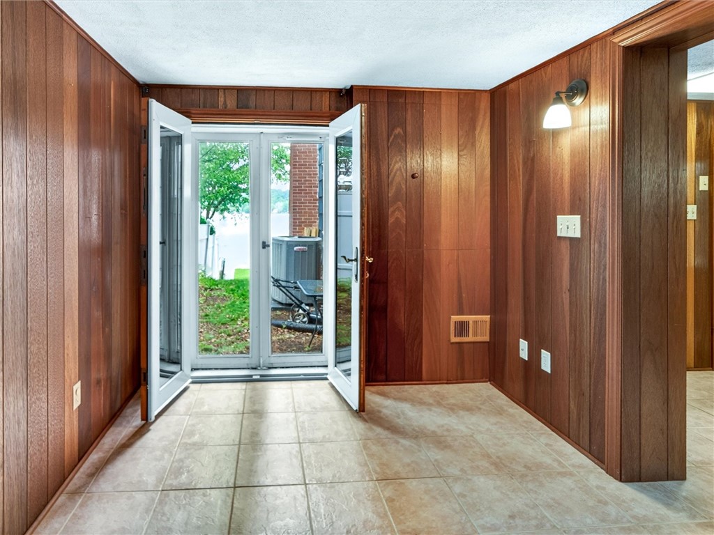 5452 East Lake Road Conesus, NY 14435 - Photo 27 of 42 1st floor Bedroom w/ door to rear yard