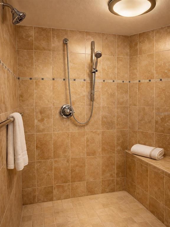 420 Harding Avenue, Unit 301 Cocoa Beach, FL 32931 - Photo 14 of 57 a bathroom with a shower