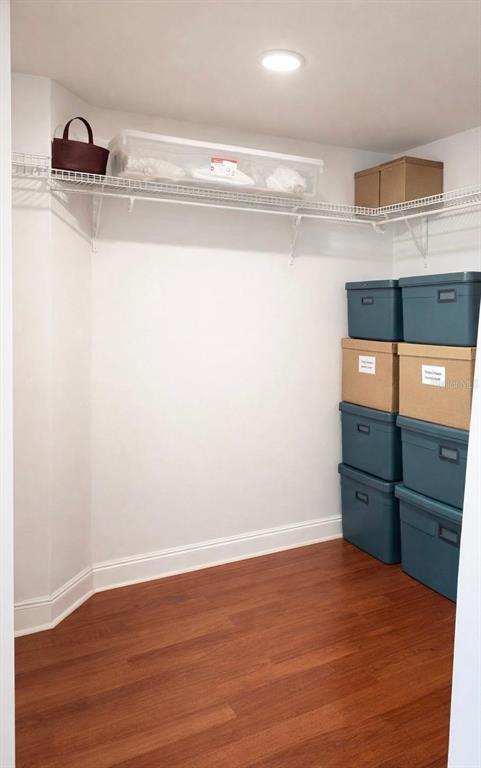 420 Harding Avenue, Unit 301 Cocoa Beach, FL 32931 - Photo 15 of 57 a view of a kitchen with wooden floor