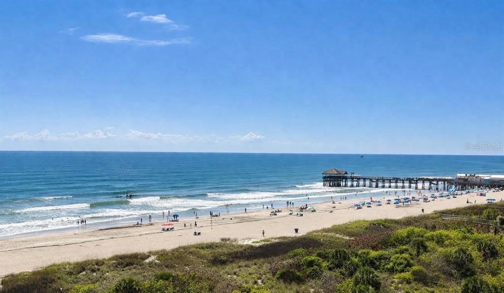 420 Harding Avenue, Unit 301 Cocoa Beach, FL 32931 - Photo 30 of 57 a view of an ocean and beach
