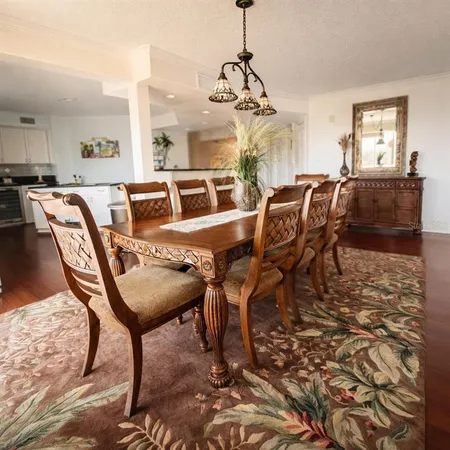 a view of a dining room with furniture