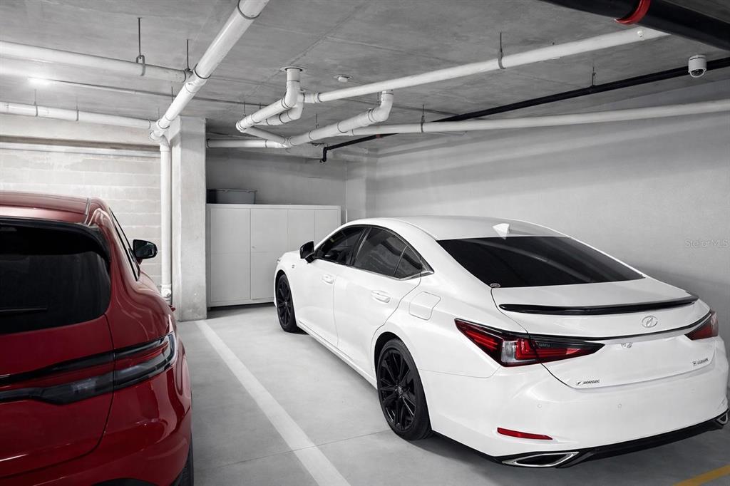 420 Harding Avenue, Unit 301 Cocoa Beach, FL 32931 - Photo 48 of 57 a car parked in a garage