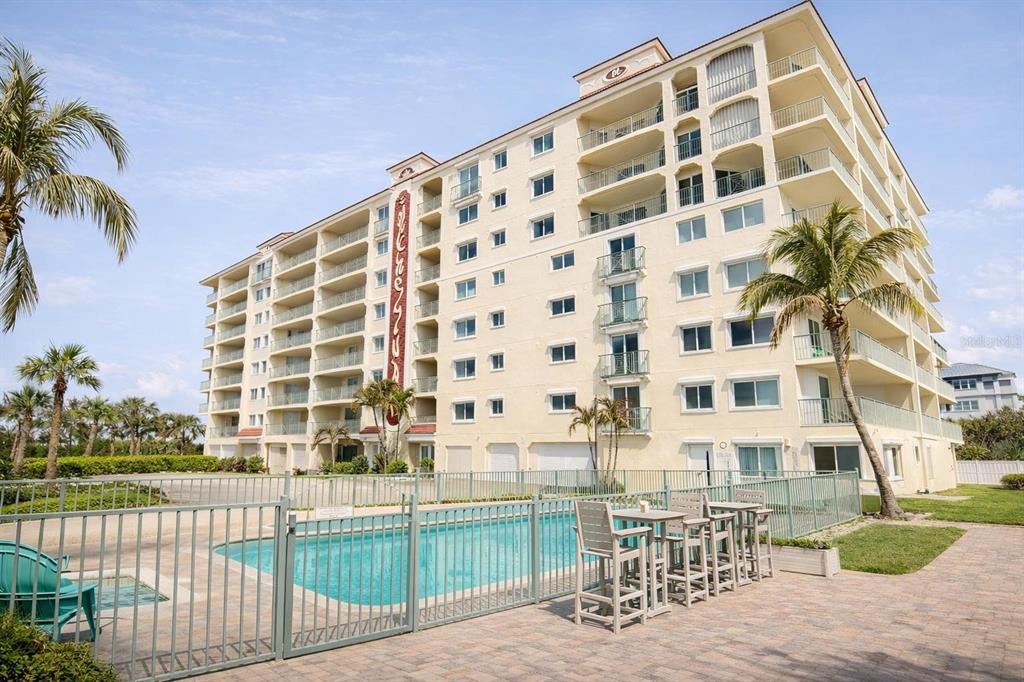 420 Harding Avenue, Unit 301 Cocoa Beach, FL 32931 - Photo 51 of 57 a view of a large building