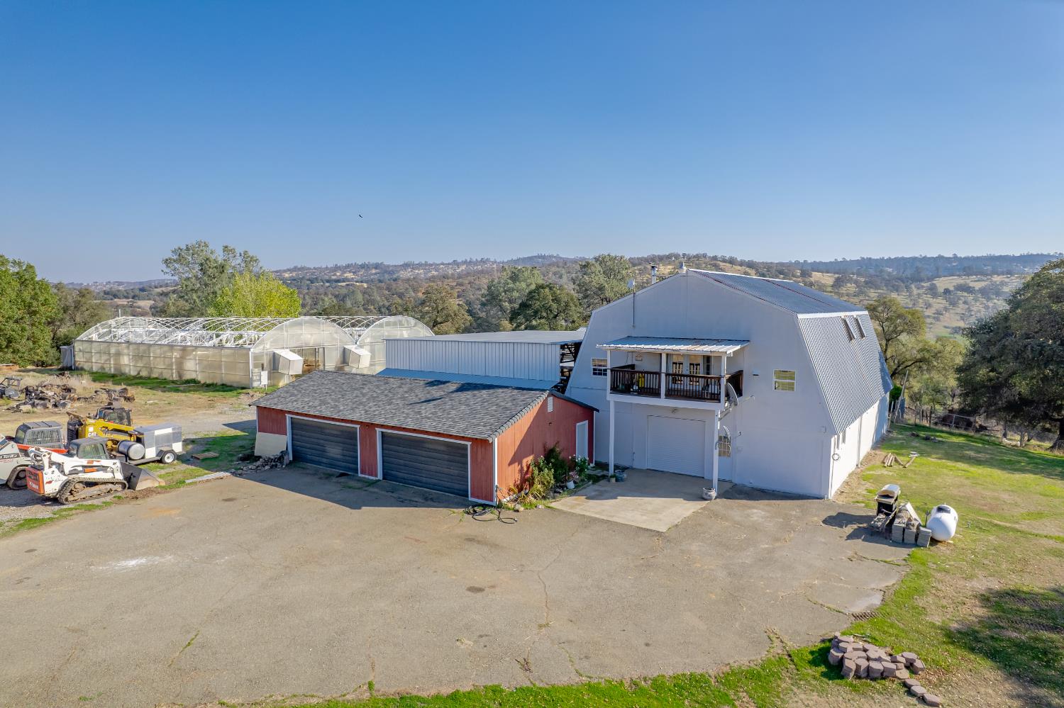 5585 Garden Bar Road, Unit 2 Lincoln, CA 95648 - Photo 2 of 65 a aerial view of a house with a yard and balcony
