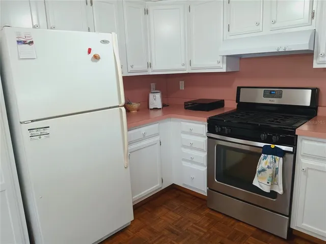a bedroom with bed and window