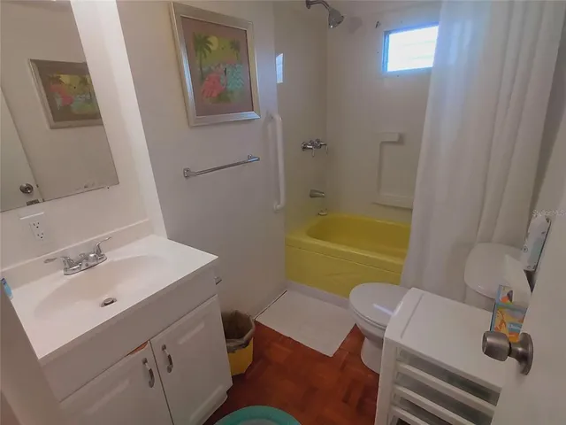 a bathroom with a sink and a toilet