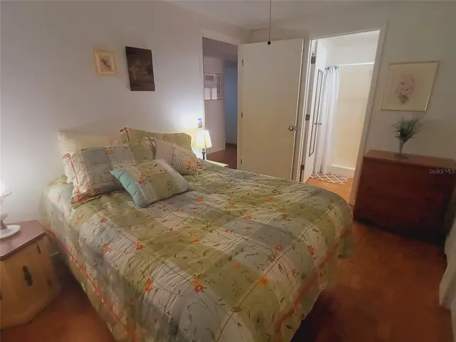 a outdoor dining space with furniture and a potted plant