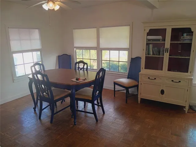 a view of a dining room with furniture
