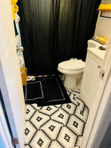 a bathroom with a sink and a toilet
