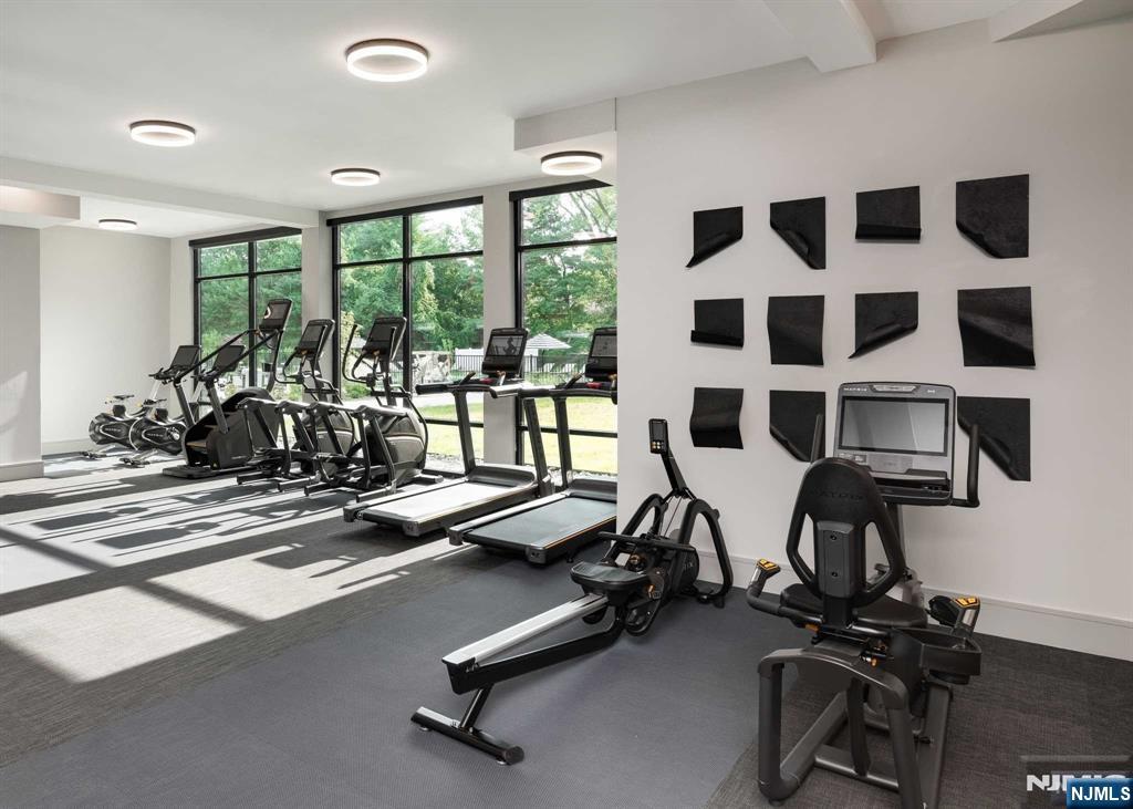 18 Park Avenue, Unit 1122 Old Tappan, NJ 07675 - Photo 17 of 33 a view of a room with gym equipment