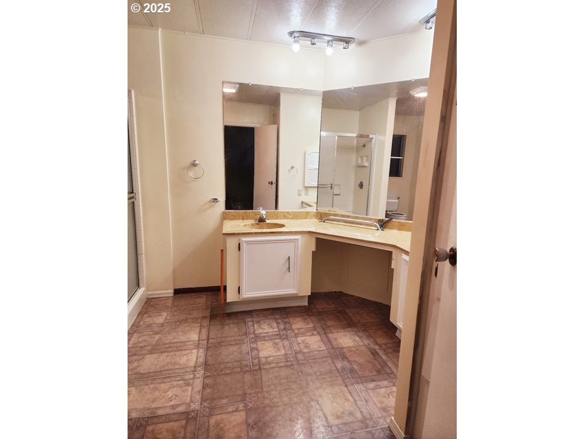 1199 North Terry Street, Unit 287 Eugene, OR 97402 - Photo 12 of 17 a view of a kitchen with a sink