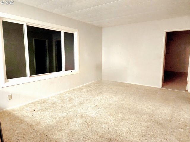 1199 North Terry Street, Unit 287 Eugene, OR 97402 - Photo 17 of 17 a view of an empty room with closet and entryway