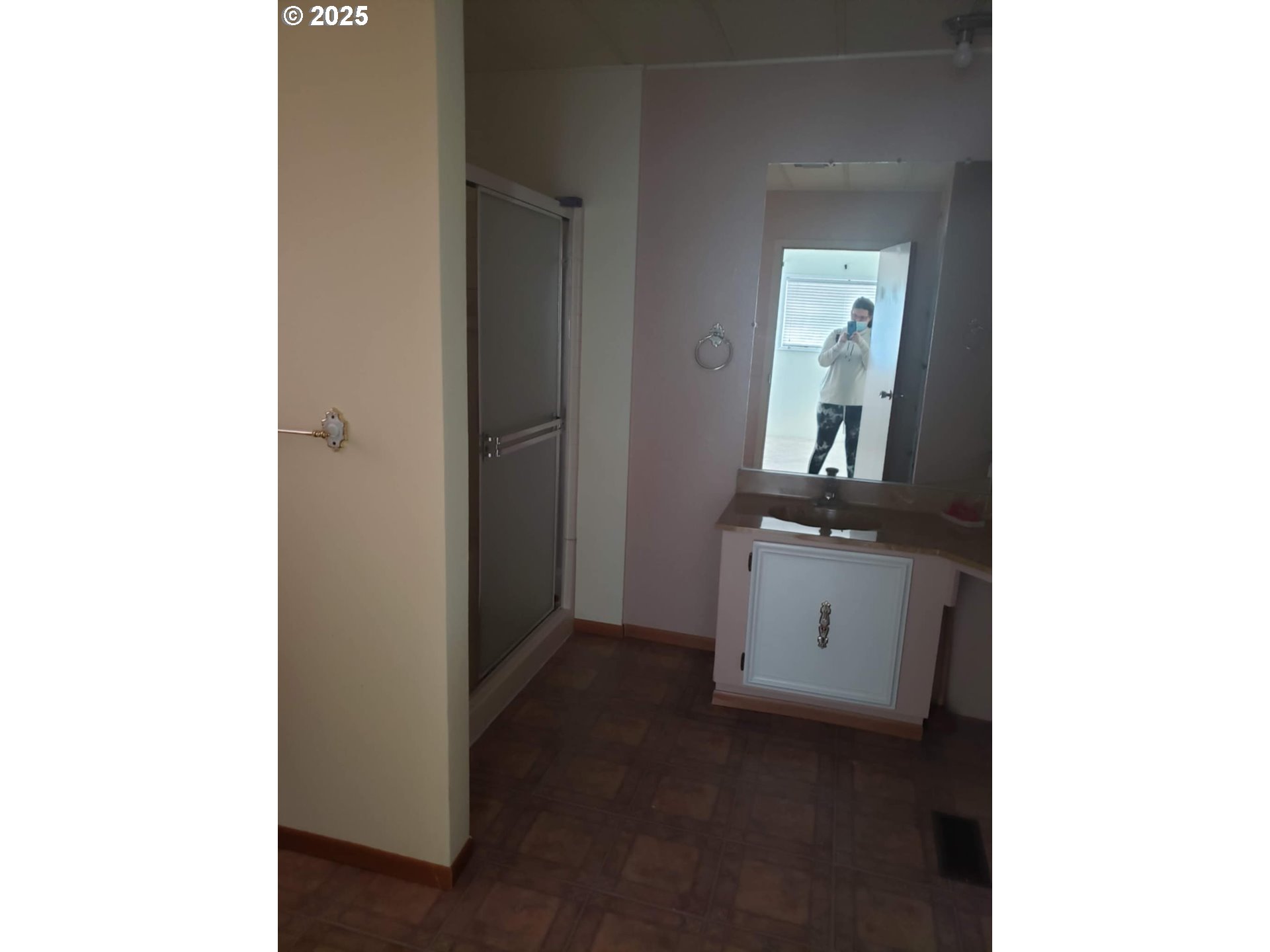 1199 North Terry Street, Unit 287 Eugene, OR 97402 - Photo 5 of 17 a room with a white cabinets