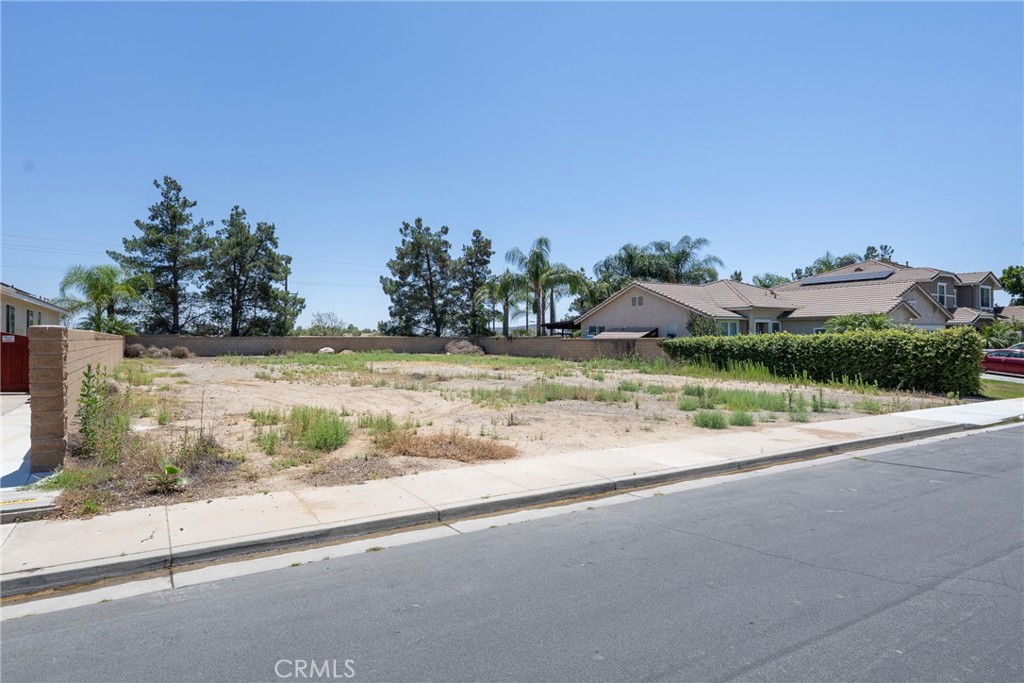 32257 Perigord Road Winchester, CA 92596 - Photo 16 of 19 a view of a road with a yard