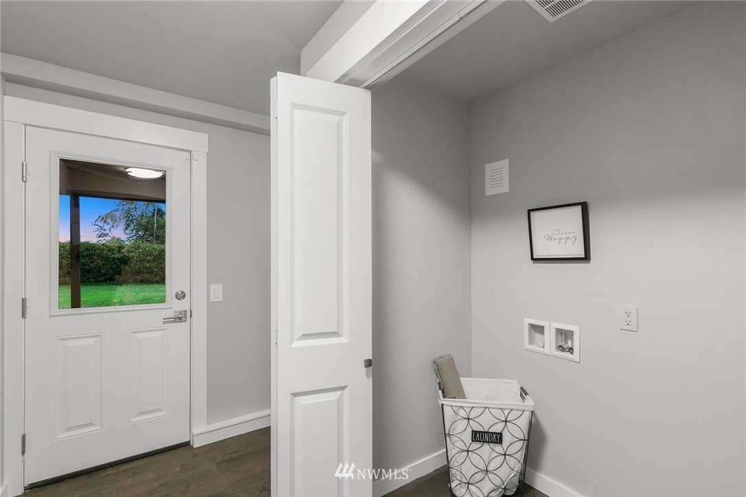 12110 Southeast 60th Place Bellevue, WA 98006 - Photo 24 of 32 a view of a small space with wooden floor and a window