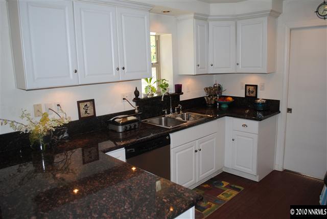 355 Andria Drive Stateline, NV 89449 - Photo 3 of 13 a kitchen with a sink and cabinets