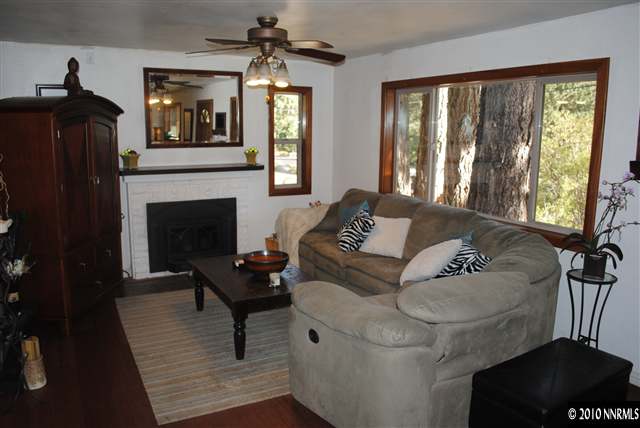 355 Andria Drive Stateline, NV 89449 - Photo 5 of 13 a living room with furniture and a fireplace