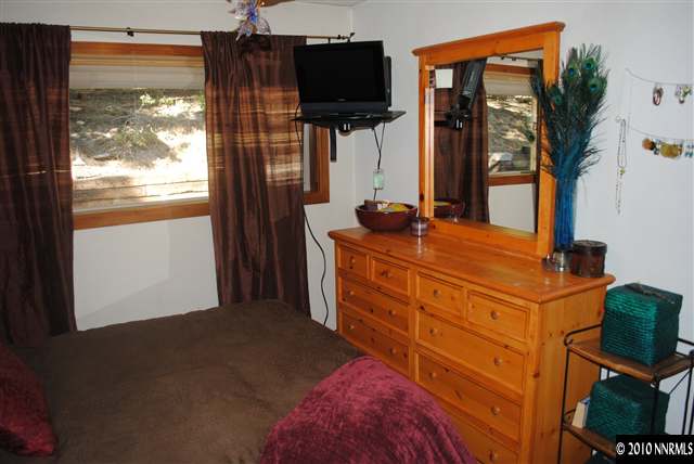 355 Andria Drive Stateline, NV 89449 - Photo 6 of 13 a room with furniture and flat screen tv