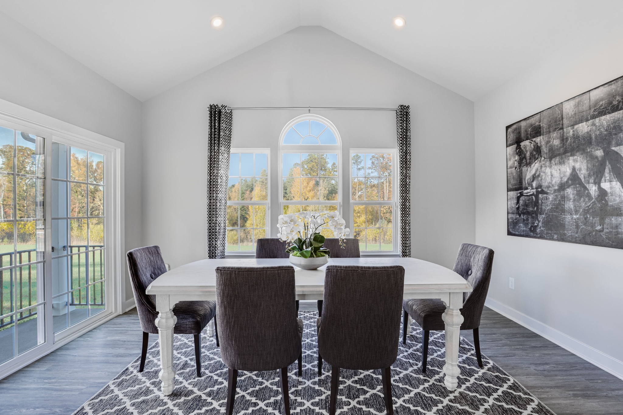 4019 Oglethorpe Drive Franklin, TN 37064 - Photo 13 of 31 a view of a dining room with furniture wooden floor and a chandelier