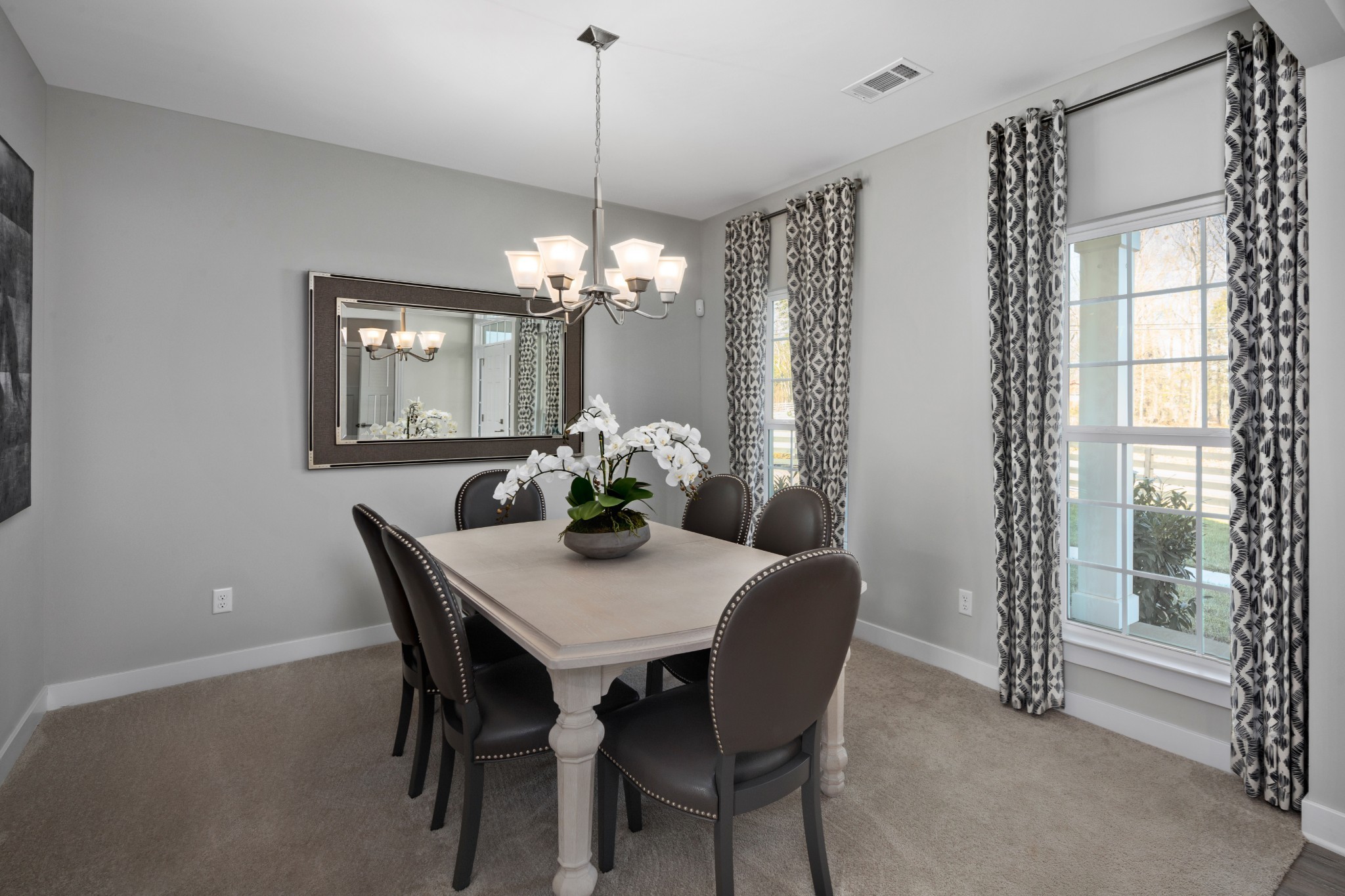 4019 Oglethorpe Drive Franklin, TN 37064 - Photo 16 of 31 a view of a dining room with furniture and chandelier